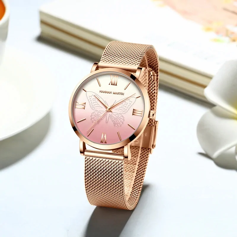 Montre papillon or rose femme, maille milanaise acier et cadran rose à papillon gravé