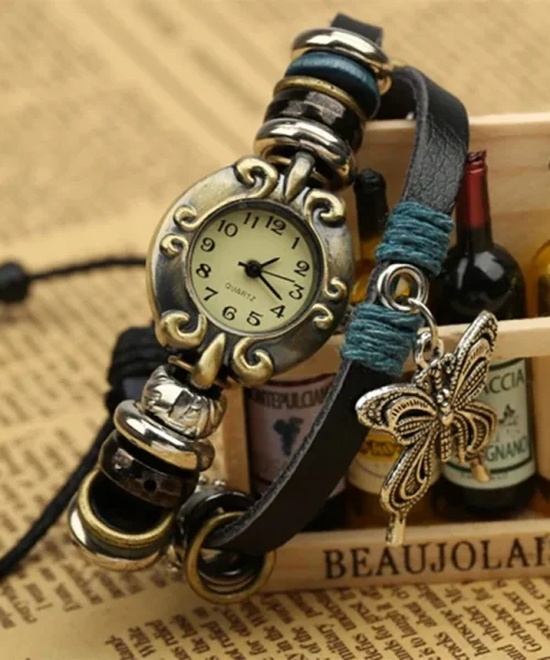 Montre papillon vintage femme, bracelet cuir enroulé et breloque papillon argentée