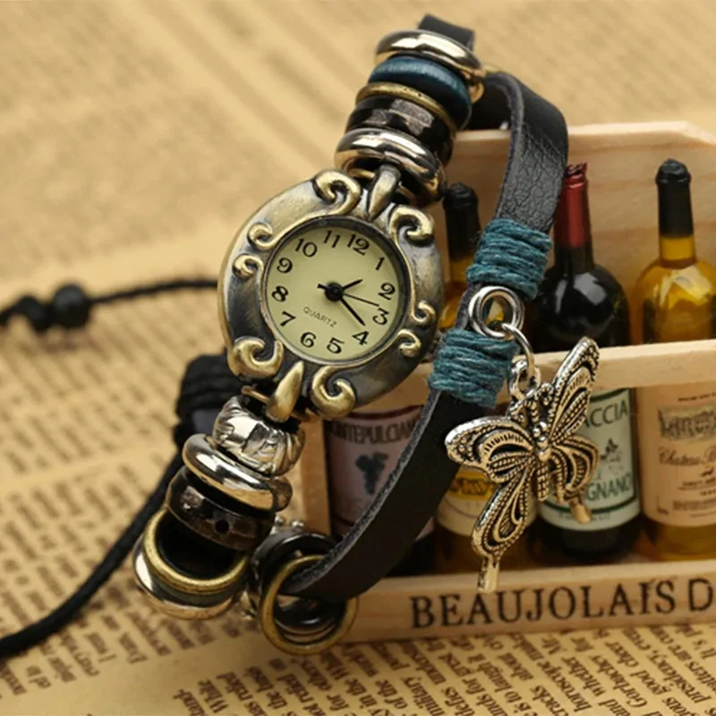 Montre papillon vintage femme, bracelet cuir enroulé et breloque papillon argentée
