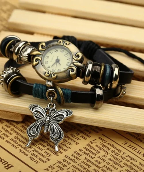 Montre papillon vintage femme, bracelet cuir enroulé et breloque papillon argentée