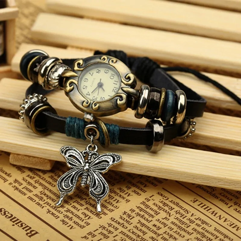 Montre papillon vintage femme, bracelet cuir enroulé et breloque papillon argentée