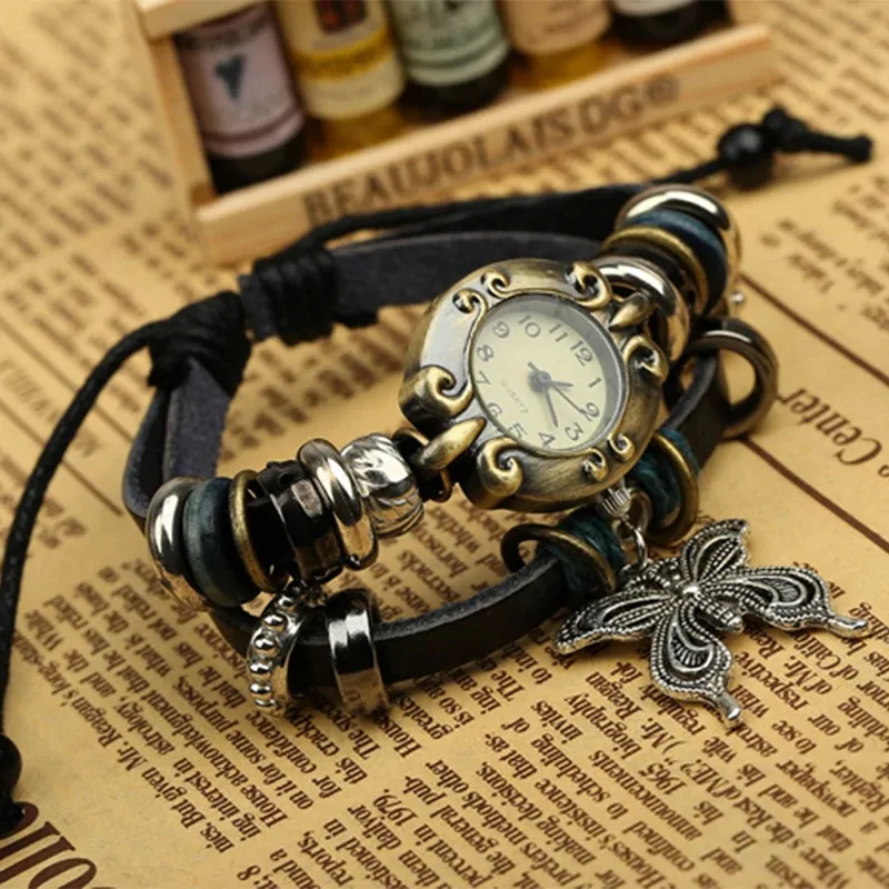 Montre papillon vintage femme, bracelet cuir enroulé et breloque papillon argentée