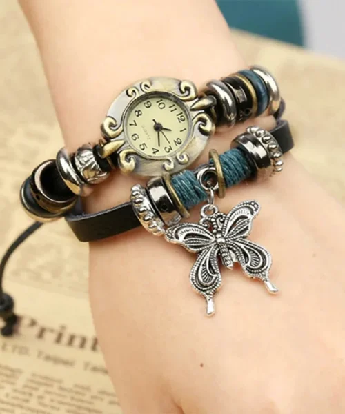 Montre papillon vintage femme, bracelet cuir enroulé et breloque papillon argentée