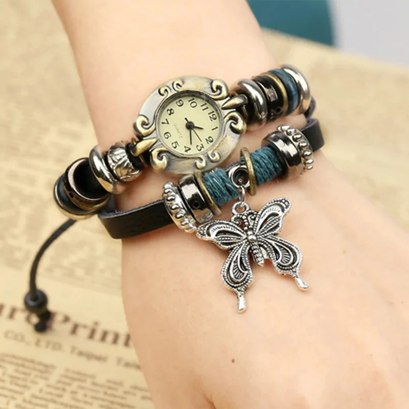 Montre papillon vintage femme, bracelet cuir enroulé et breloque papillon argentée