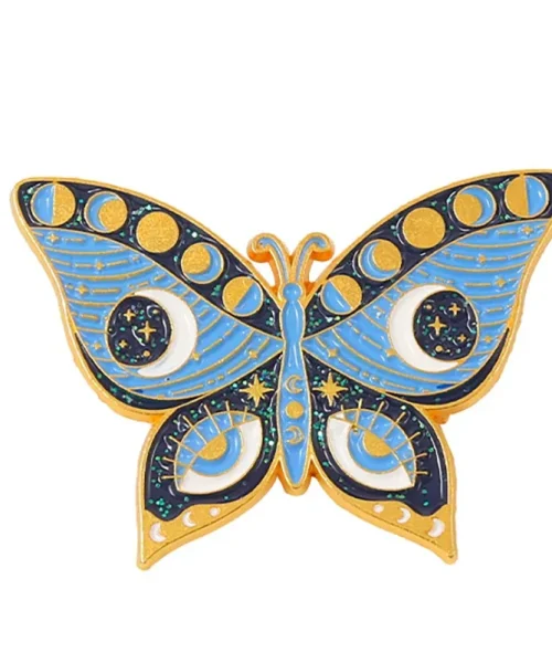 Pin's papillon céleste bleu ciel en émail, lunes et étoiles dorées