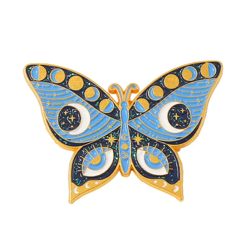 Pin's papillon céleste bleu ciel en émail, lunes et étoiles dorées