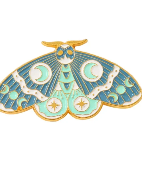 Pin's papillon céleste turquoise en émail, lunes et étoiles dorées