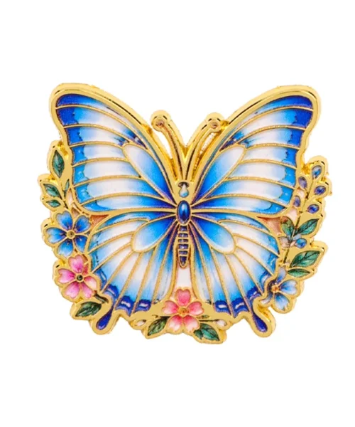 Pin's papillon fleuri bleu ciel, papillon en émail sur couronne de fleurs dorée