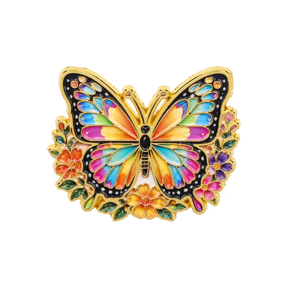 Pin's papillon fleuri multicolore, papillon en émail sur couronne de fleurs dorée