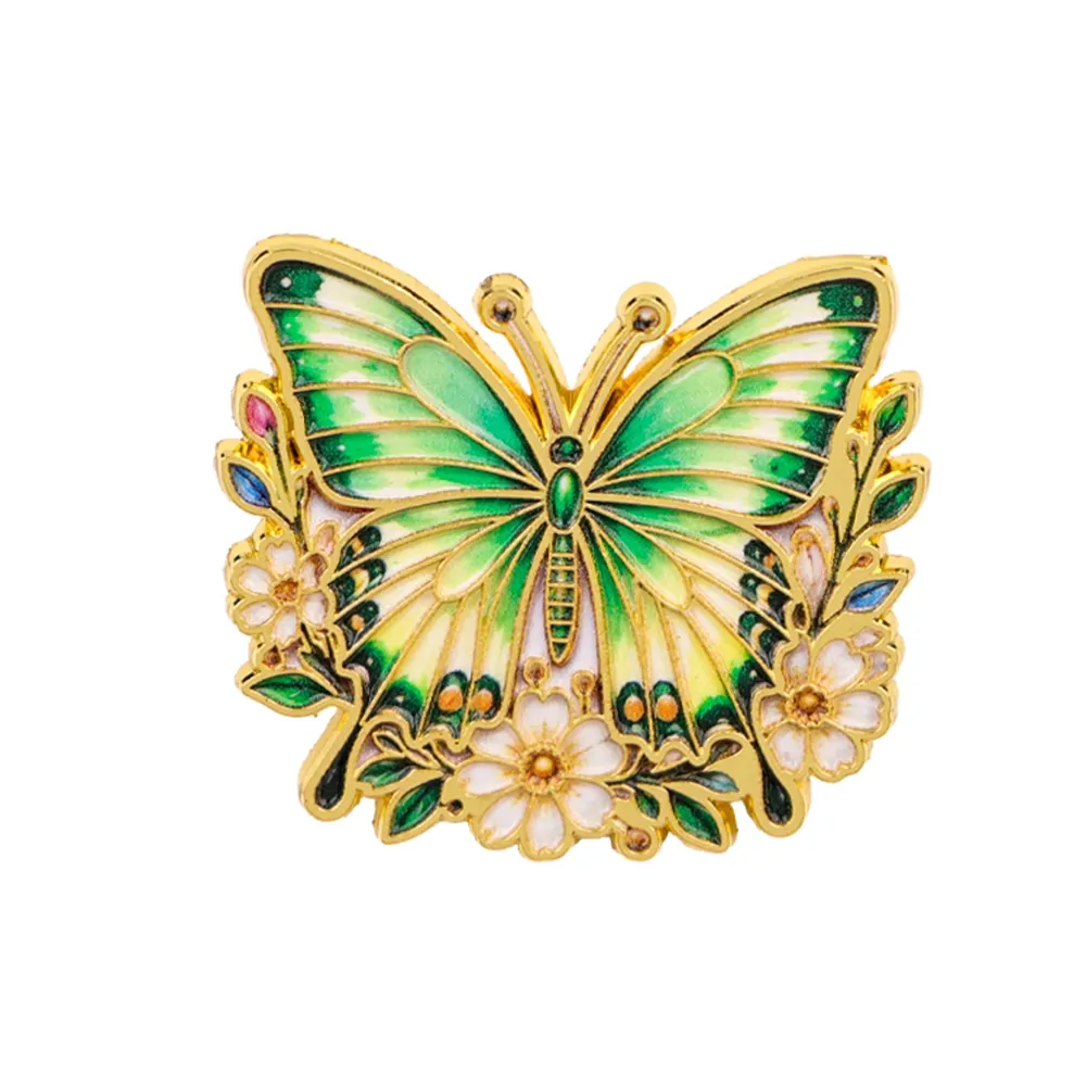 Pin's papillon fleuri vert, papillon en émail sur couronne de fleurs dorée