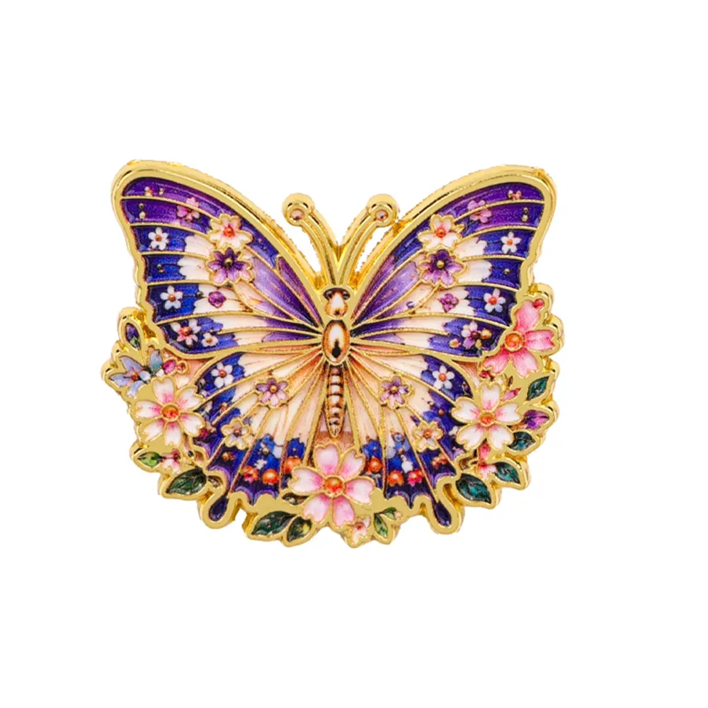 Pin's papillon fleuri violet fleuri, papillon en émail sur couronne de fleurs dorée