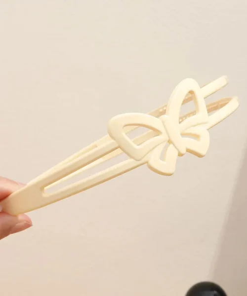 Serre-tête papillon double rang crème, deux branches et papillon ajouré ton sur ton