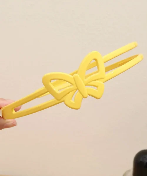 Serre-tête papillon double rang jaune, deux branches et papillon ajouré ton sur ton