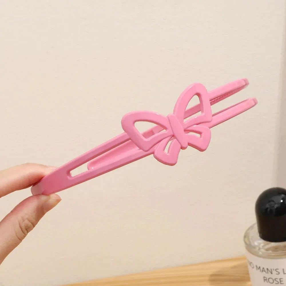 Serre-tête papillon double rang rose, deux branches et papillon ajouré ton sur ton