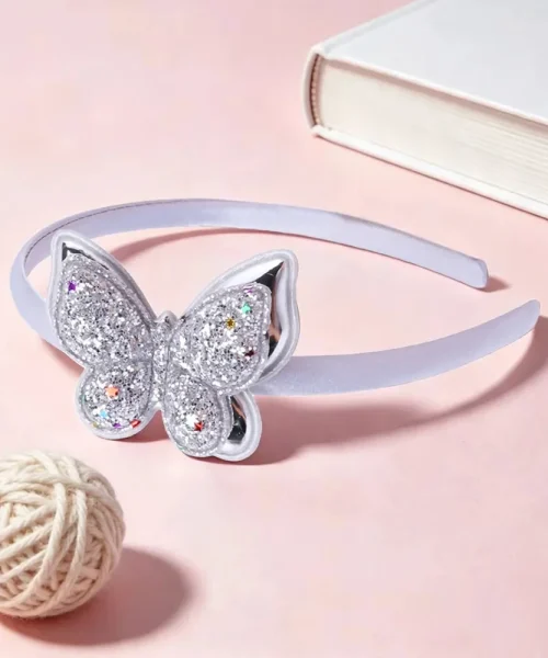 Serre-tête papillon pailleté argenté, arceau satiné et papillon à paillettes semé d'étoiles