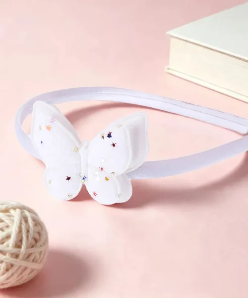 Serre-tête papillon pailleté blanc, arceau satiné et papillon à paillettes semé d'étoiles