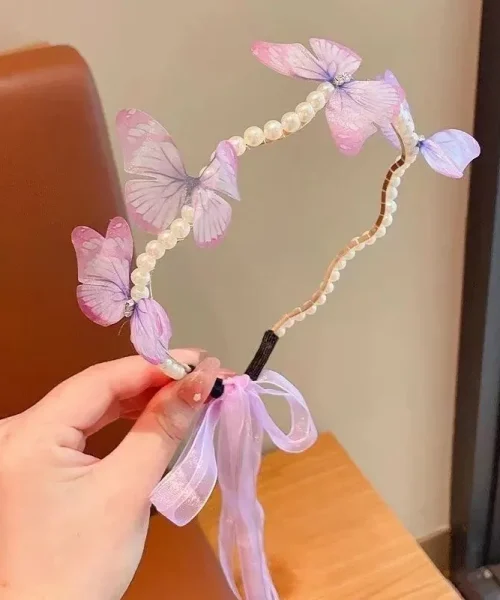 Serre-tête papillon perles et ruban violet, arceau ondulé perlé, papillons en voile et nœud d'organza