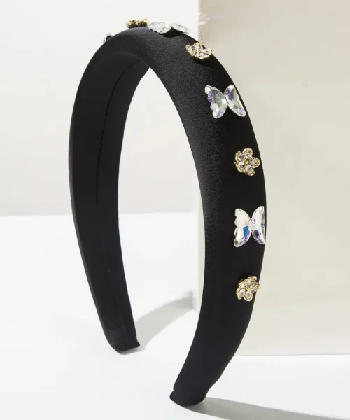 Serre-tête papillon rembourré noir, large arceau satiné orné de papillons en pierres taillées et fleurs dorées